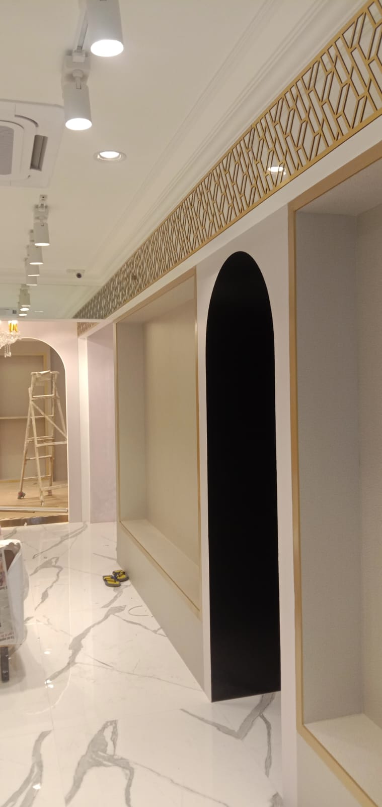 High-End Boutique Showroom Passage with Twin Arches